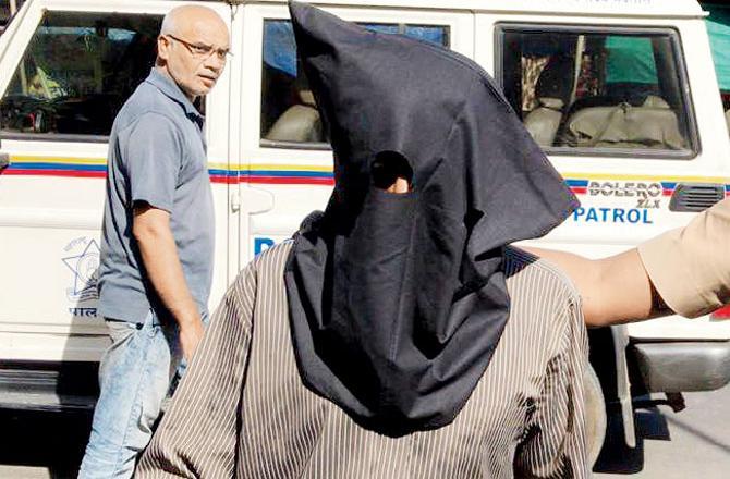 Unable to wrap their heads around the claim that Pintoo Sharma brutally hacked 53-year-old Ganesh Koladkar to death over a mere Rs 60,000, the police are investigating an angle of necrophilia (sexual act with a corpse). Sharma's wife, Sunita, told mid-day that 'her husband has been falsely implicated in the case'. She said there would be behavioural changes in a person if he is involved in a horrendous murder and chopping up of a body into multiple pieces. But, her husband returned home, behaved normally with the family and had even helped the children in their homework