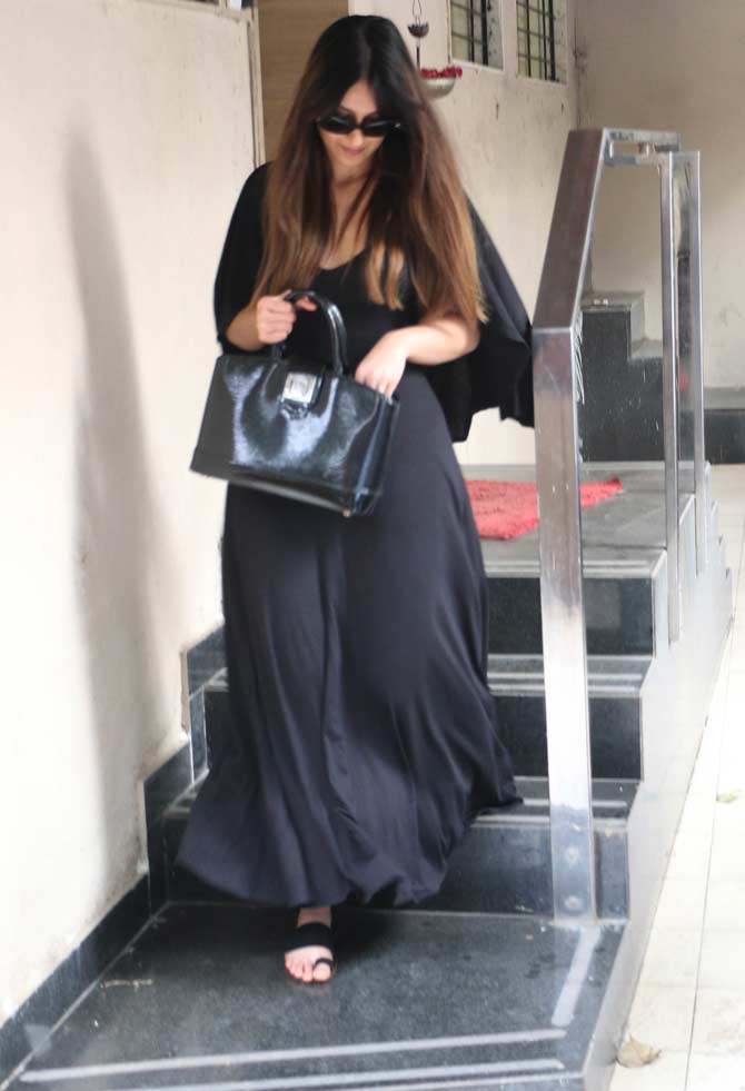 Ileana D'Cruz was spotted flaunting her curves in a pretty black maxi dress in Bandra, Mumbai. The actress completed her look with a pair of black shades and a handbag for her outing. All pictures/Yogen Shah