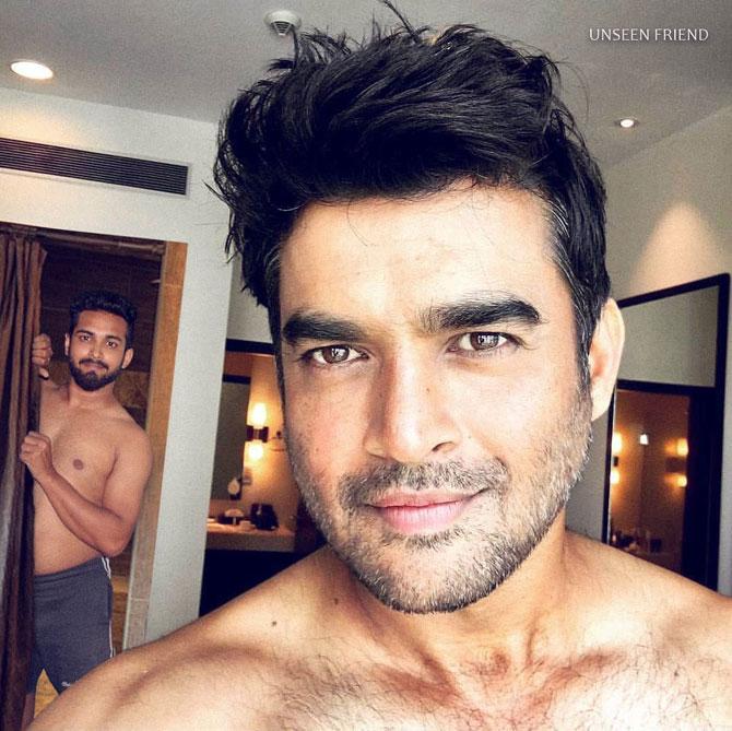 With R Madhavan: Rehnaa Hai Tere Ghar Mien. This viral picture of @actormaddy was actually photoshopped last year by me. He didn't want me to be in the frame for some reasons. But posting the real picture today for you guys. Share it with your friends, family, relatives, neighbors, enemies & maddylovers and let them see the real picture. (sic)