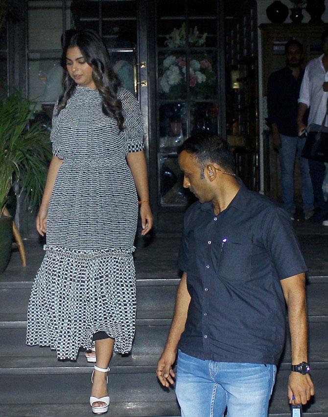 Isha Ambani was wearing a grey multi-layered maxi dress for her dinner date with Anand Piramal. 