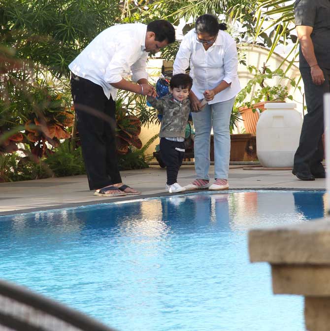 Taimur Ali Khan was then spotted at a swimming pool where the child gleefully looked at the water, even maybe wanting to take a dip or two. However, he was stopped by his caretakers.