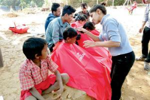 Thane youths give free haircuts to 150 kids to teach them personal care