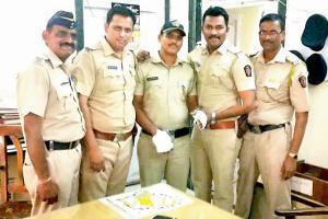 Constable risks life to save family from blaze in Girgaum