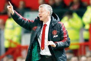 Manchester United aim to dent Liverpool's title hopes