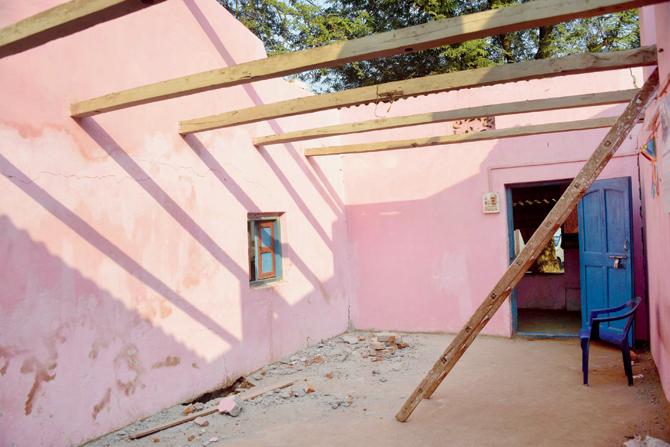 The roof of one of the homes that caved in following the February 1 quake in the village.