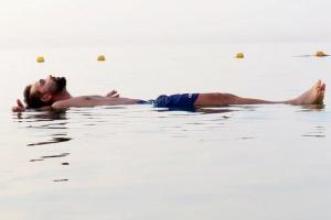 Ajinkya Rahane enjoys floating over the Dead Sea in Jordan