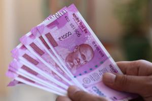 Rupee slips 9 paise to 71.17/USD in early trade ahead of interim budget