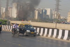 Mumbai: Car catches fire on SCLR