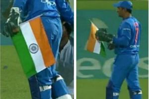 Viral Video: Dhoni rescues Indian flag with lightning quick reflexes