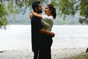 Virat Kohli romances Anushka Sharma besides a river in New Zealand