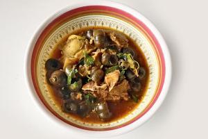 Try a Manipuri dish of snails with pork at this restaurant in Kalina