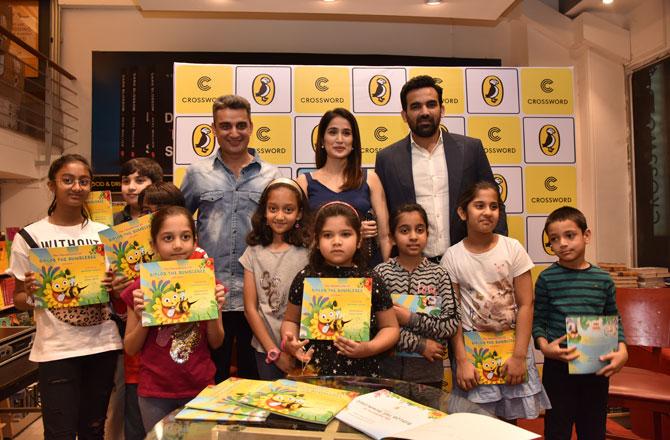 Zaheer Khan and Sagarika Ghatge with kids at book launch