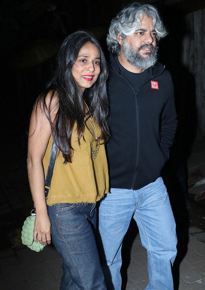 Shaad Ali with wife Aarti Patkar arrives for Farhan Akhtar's birthday bash at his home in Bandra.