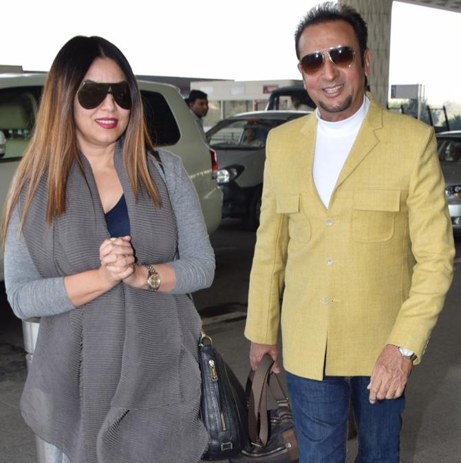 Gulshan Grover and Mahima Chaudhary were all smiles as paparazzi clicked them while on their way to immigration. 
