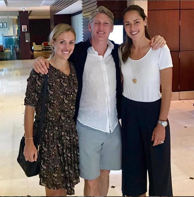 Angelique Kerber pictured here with tennis star Ana Ivanovic and German footballer Bastian Schweinsteiger