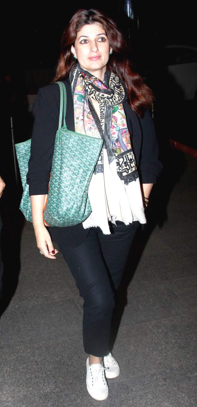 Twinkle Khanna opted for black denim, paired with a black shrug and a boho stole as her airport look! 