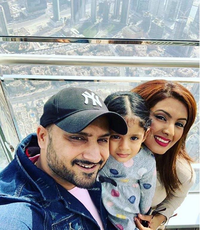 Harbhajan Singh posted this picture with Geeta Basra and daughter Hinaya from the top of Burj Khalifa: The tallest building in the world. He visited the 143rd floor of the building.