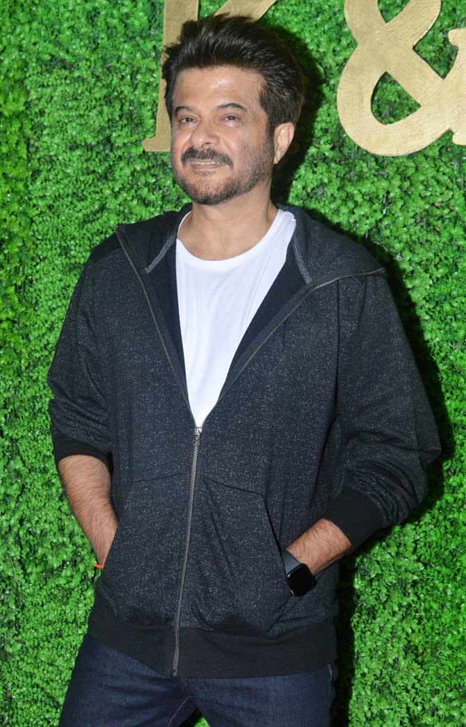 Anil Kapoor kept it simple but looked handsome as always as he posed on the red carpet for the shutterbugs at Sameer Anjaan's daughter Suchita Pandey's wedding reception.