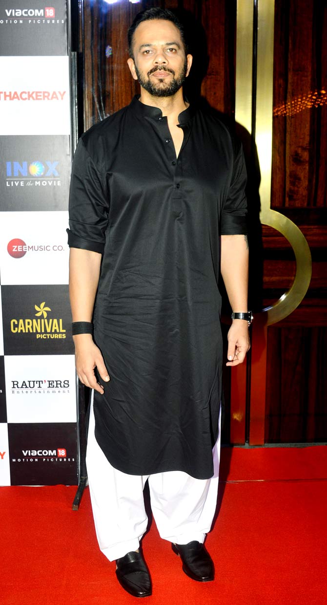 Rohit Shetty attended the special screening of Nawazuddin Siddiqui and Amrita Rao starrer Thackeray, held at a popular multiplex. The masala film director opted for a black and white pathani for the outing.