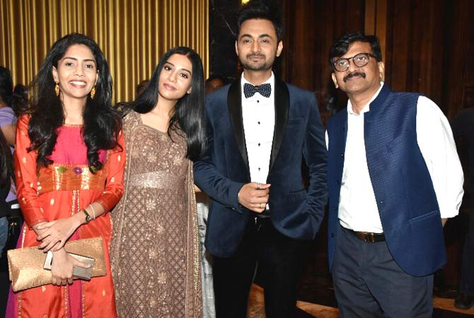 Amrita Rao, RJ Anmol and Sanjay Raut posed for the shutterbugs as they arrive for the special screening of Thackeray biopic.