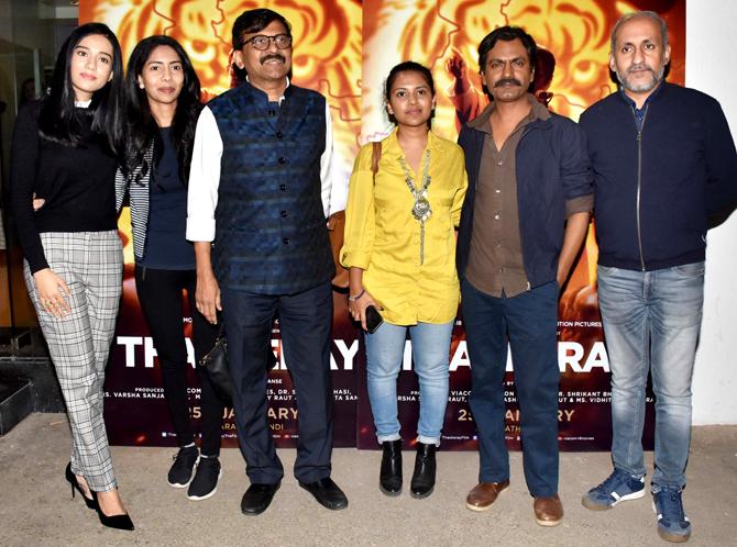 Nawazuddin Siddiqui and Amrita Rao pose Sanjay Raut and other guests at the special screening of Thackeray.