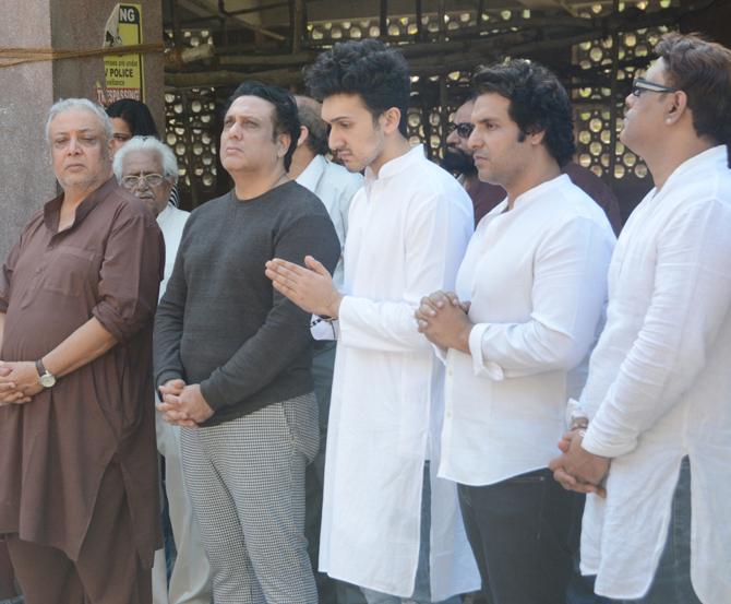 Kirti Kumar, Govinda along with his son Yashvardan Ahuja and their family members were spotted at Janwendra Ahuja's funeral, which took place on Friday - January 25, in Mumbai. On Thursday, Govinda's 34-year-old nephew, and son of actor-director Kirti Kumar, Janwendra Ahuja, also known as Dumpy was found dead inside his Andheri residence. (All photos/Yogen Shah)