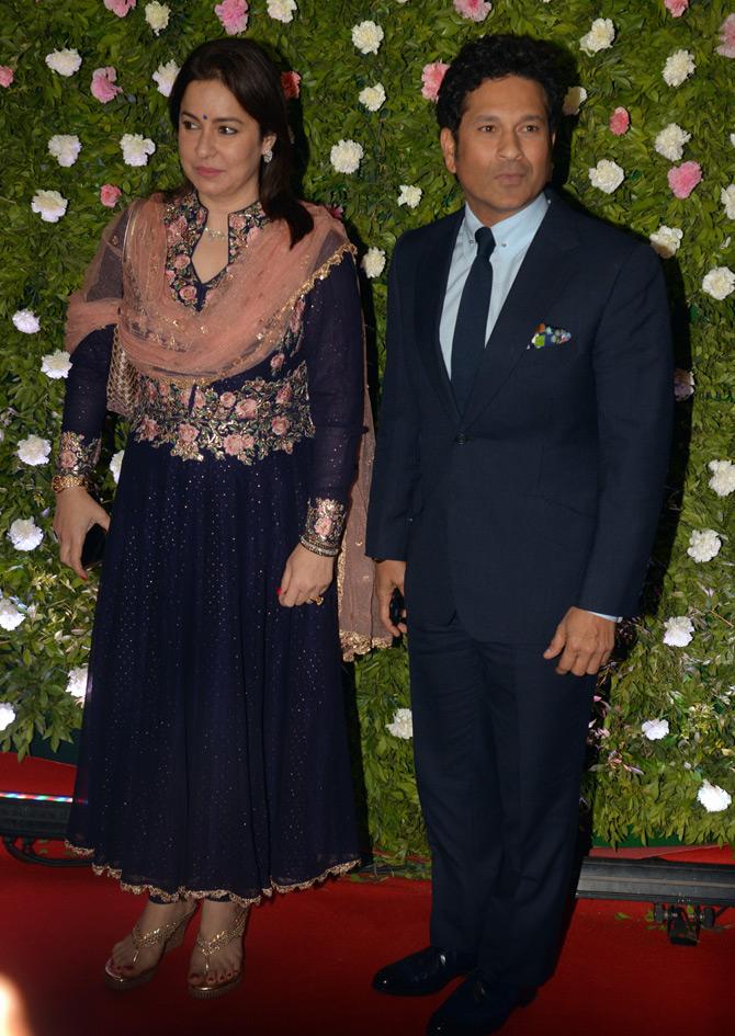 Sachin Tendulkar and his wife Anjali Tendulkar attend the wedding reception of Raj Thackeray's son Amit. Sachin and his wife Anjali Tendulkar were twinning in navy blue. Earlier in the day, the Sachin and Anjali also graced the traditional wedding ceremony of Amit Thackeray and Mitali Borude.