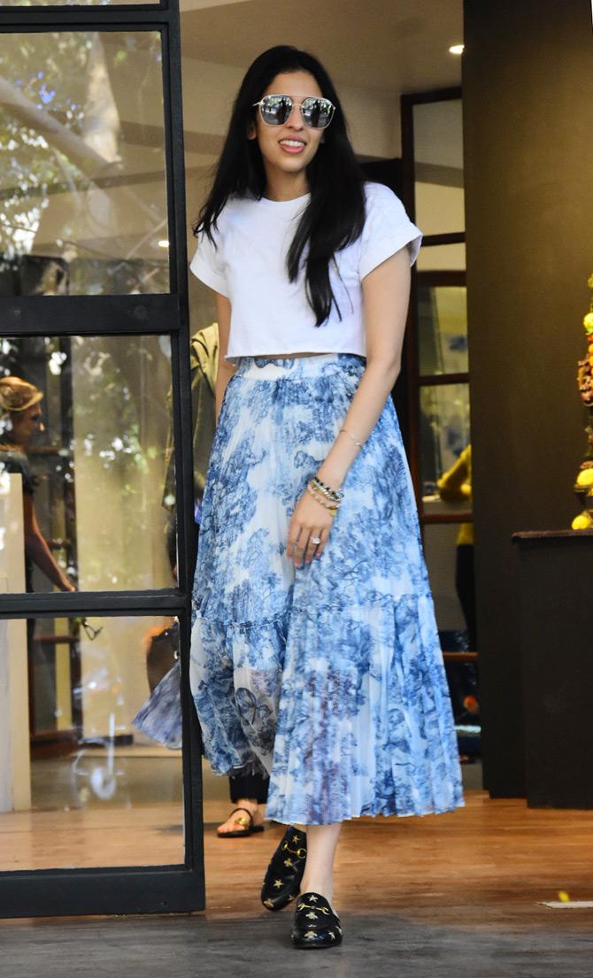 Shloka Mehta seen getting into her bride mode shopping for her D-day at designer Monisha Jaising's store in Bandra. Shloka sported a blue floral skirt and completed her look with a white crop top.In picture: Shloka Mehta can be seen coming out of the fashion designer's store.