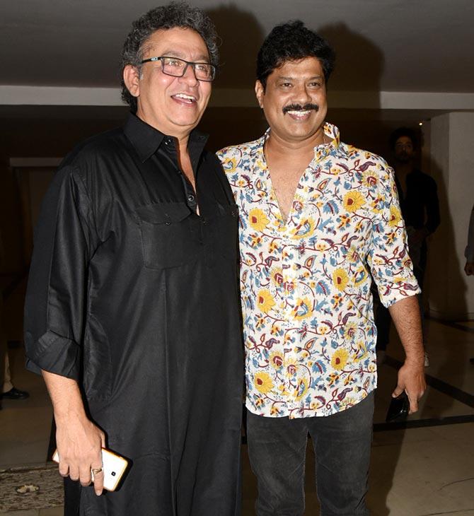 Marathi actors Uday Tikekar and Ganesh Yadav were all smiles as they pose for the photographers at Simmba success party.