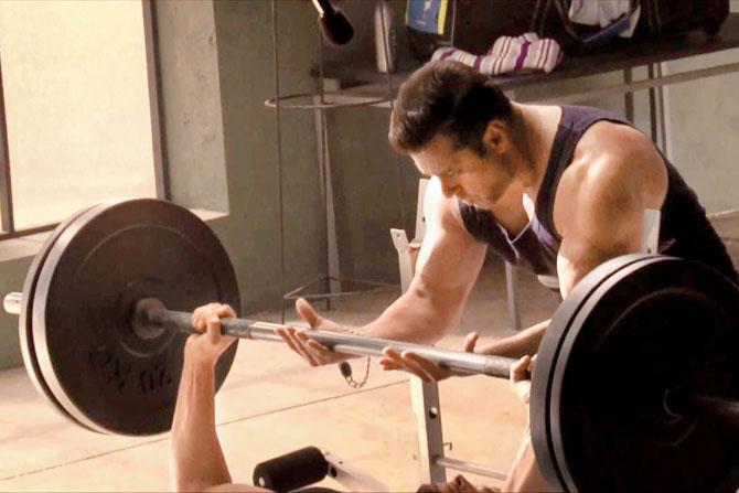Khan during his workout regimen. Pic/Twitter