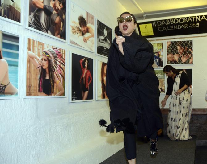 Rekha acts goofy for the paps