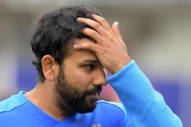 Indian vice-captain Rohit Sharma's face is a picture of disappointment at the end of play during the 2019 Cricket World Cup first semi-final between New Zealand and India at Old Trafford in Manchester, northwest England