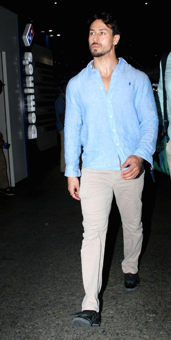 As the two biggest action superstars of B-town, Hrithik Roshan and Tiger Shroff get ready to take on each other in Yash Raj Films (YRF) War, the makers had decided to strictly keep everything under wraps. Before giving out the teaser on July 15, the title and visuals, despite the fact that the film's release is less than three months away, was not revealed at all. Hrithik and Tiger are sporting interesting looks and all the visuals are filled with high-octane stunts.
In picture: Tiger Shroff at the Mumbai airport.