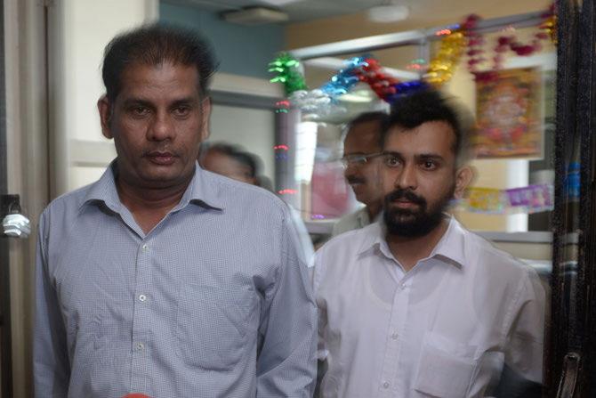 In pic: Placido Carvalho (one the left) one of two defendants in the case of the rape and death of British schoolgirl Scarlett Keeling whose body was found in Goa in 2008, is surrounded by the media as he leaves the Children's Court in Panaji on September 23, 2016. Pic/AFP