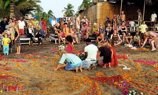 In pic: Foreign tourists take part in the mourning ceremony of British national Scarlett Keeling whose body was found on the Anjuna beach in Goa on February 18, 2008. Pic/AFP