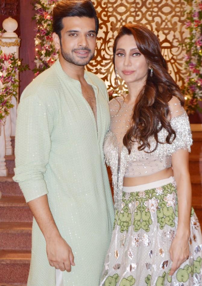 For the launch event, the duo stunned the audience with their outfits. Anusha rocked the floor in her white attire, while Karan looked dapper in his traditional avatar. He donned a green kurta and white pyjama.