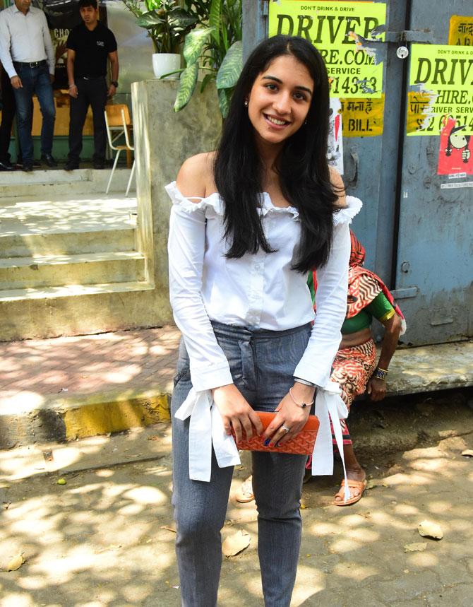 In pic: Radhika Merchant poses for paparazzi as she steps out of the popular eatery in Bandra.