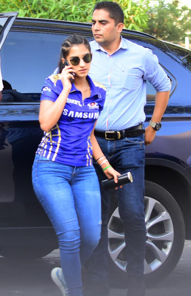 During the IPL season, Radhika Merchant was snapped with the Ambani family at a private airport in Mumbai leaving for Hyderabad to witness an IPL match. Radhika Merchant had accompanied the Ambani family donning the Mumbai Indian jersey paired with blue denims and black sunglasses and looked uber-cool.