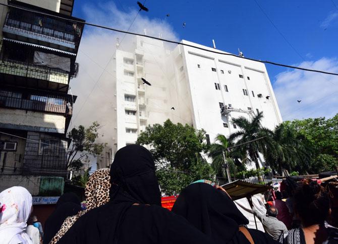 Cooling operations at the MTNL building in suburban Bandra were underway on Tuesday. The third, fourth and fifth floors of the nine-storey building were the worst affected due to the blaze. Though the fire was brought under control on Monday, evening, the cooling operations were on to eliminate the smoke and any chances of a blaze