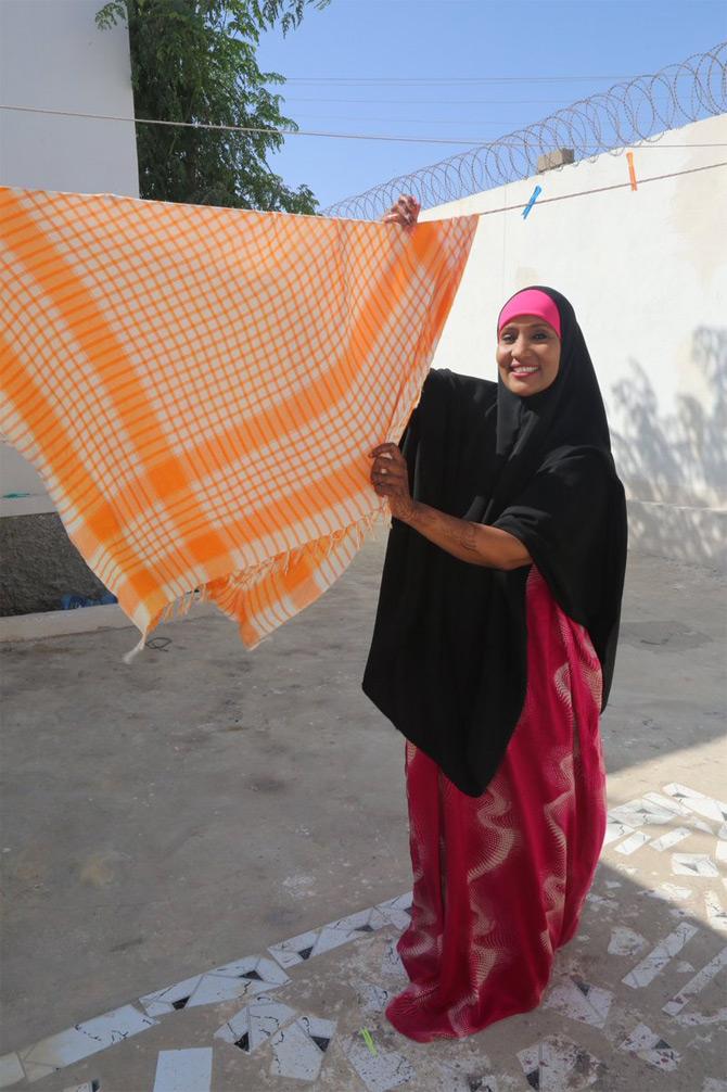 Hidan Nalayeh poses for a picture post the laundry work. While sharing the picture, Hodan Nalayeh wrote: Posted a photo on my IG doing laundry in Somalia and people found it fascinating. What's so amazing about a woman washing her family's clothes in 2019? Can't women have a career & home goals at the same time?