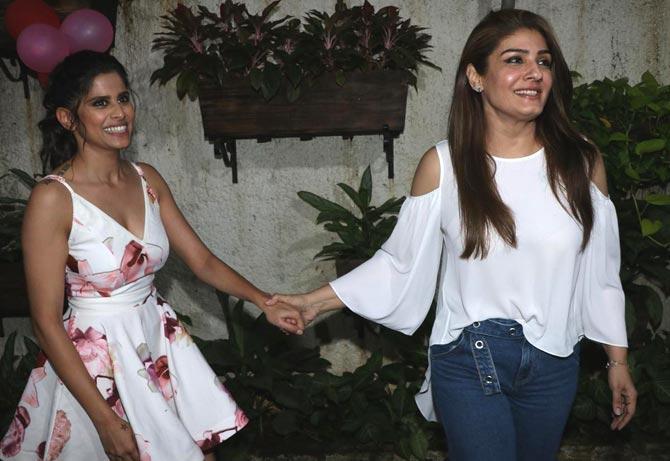 The film is a debut production of Sajid Nadiadwala's sister Afeefa Nadiadwala. The film is slated to release on 26 July 2019.
In picture: Saie Tamhankar looked pretty in her floral white dress, while Raveena wore a white top and denim at the special screening of Marathi film Girlfriend.
