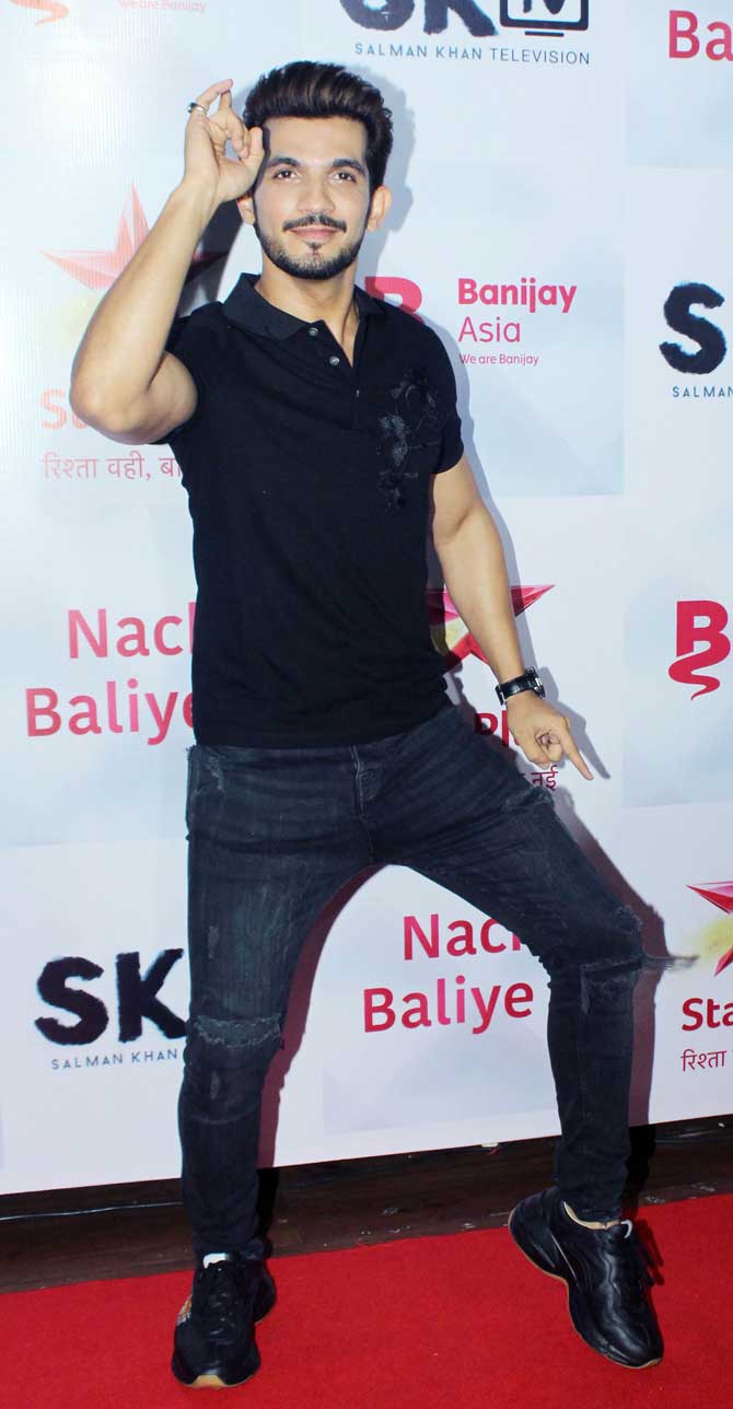 Arjun Bijlani, who was last seen in Ishq Mein Marjawan, posed for the shutterbugs as he arrived at the success party of Nach Baliye 9.