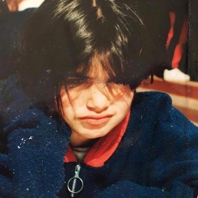 Gabriella Demetriades was born on April 8, 1987, in Port Elizabeth, South Africa. 
Pictured: A young Gabriella in what appears to be short hair and a grumpily cute expression on her face.
