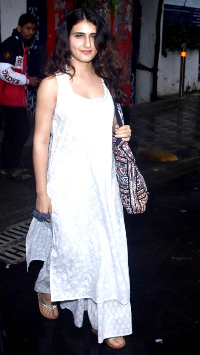 Fatima Sana Shaikh was also spotted in Juhu, Mumbai, wearing a pretty white kurta with matching palazzo pants. The actress kept her look simple with minimal makeup and open wavy hair.