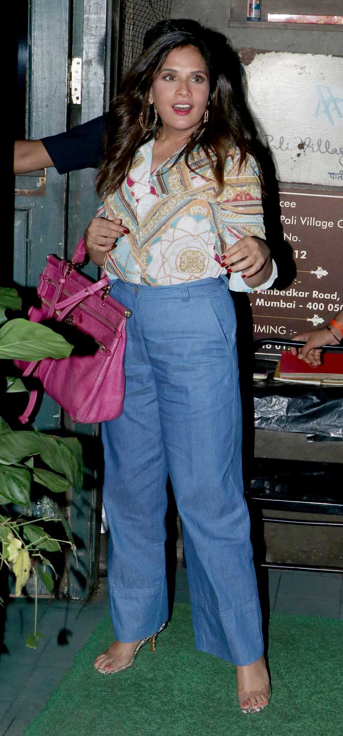 Richa Chadha was spotted with boyfriend Ali Fazal at a popular restaurant in Bandra, Mumbai. The actress was seen wearing a shirt, paired with denim wide-legged pants and stilettos for the outing. All pictures/Yogen Shah
