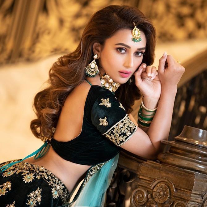Mimi Chakraborty finished her schooling from Holy Child School, Jalpaiguri, and St. James' School, Binnaguri after which, she did her graduation in English from Asutosh College, Kolkata.
In photo: Mimi Chakraborty rocks the wedding look in an Indian attire during bff Nusrat Jahan's wedding reception.