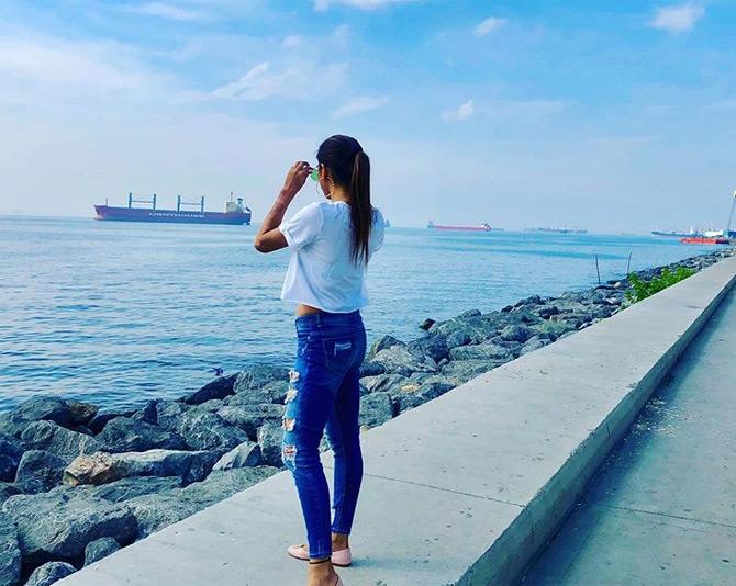 While Nusrat Jahan won the Basirhat constituency her friend and current Member of Parliament (MP) Mimi Chakraborty won the Jadavpur constituency as TMC candidate from West Bengal.
In photo: Mimi Chakraborty sports a casual tee and denim as she poses amidst the backdrop of the sea. She captions the pic: I see u.