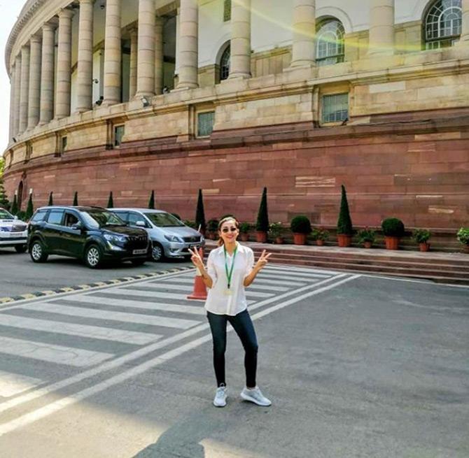 Bengali actress Mimi Chakraborty recently contested the 2019 Lok Sabha elections as Trinamool Congress party candidates and won their respective seats. The two recently took oath as a member of the 17th Lok Sabha.
In photo: Mimi Chakraborty poses outside the parliament as she captions the picture: Remember your dreams and fight for them!
