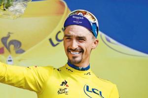 Julian breaks away to take overall lead Julian breaks away to take overall lead