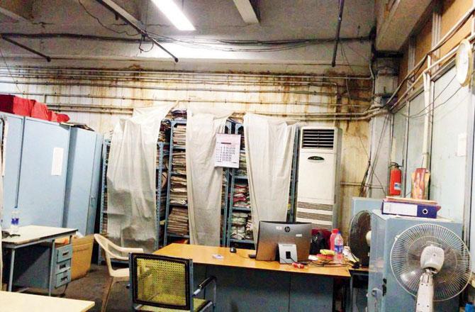 Customs clearing agents and cargo airlines staff work inside the dilapidated building